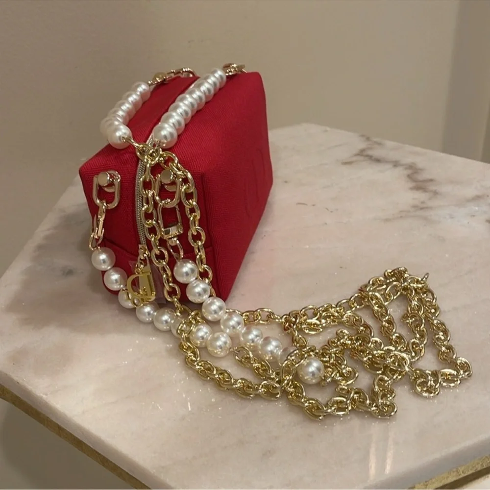 Christian Dior red canvas cosmetics bag to shoulder bag
